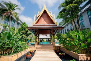 Outdoor pool, open 6:00 AM to 10:00 PM, pool umbrellas, pool loungers