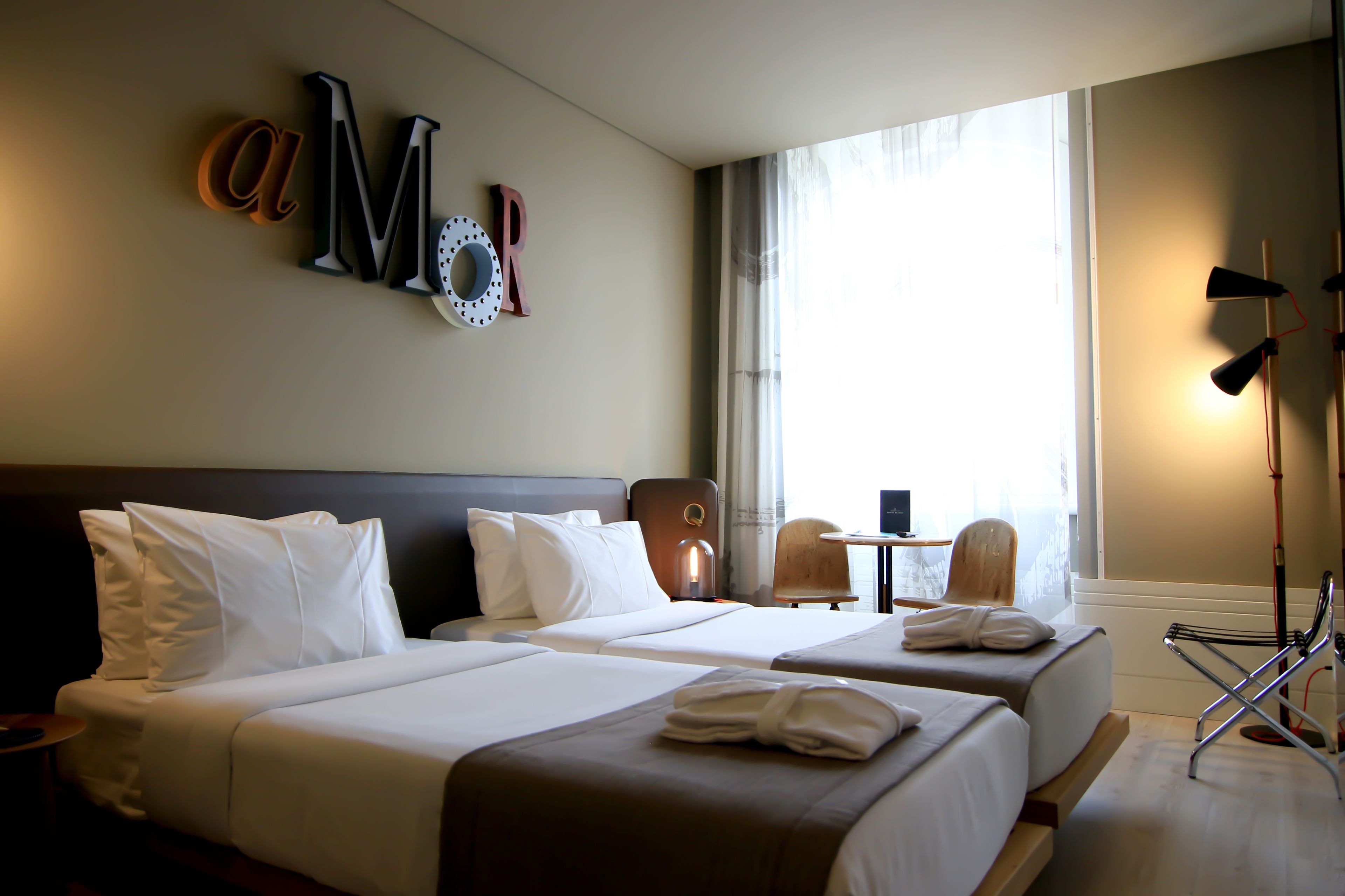 family room | down duvets, minibar, in-room safe, desk