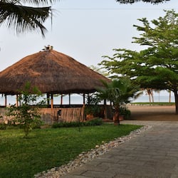 Private beach, free beach cabanas, beach bar, surfing