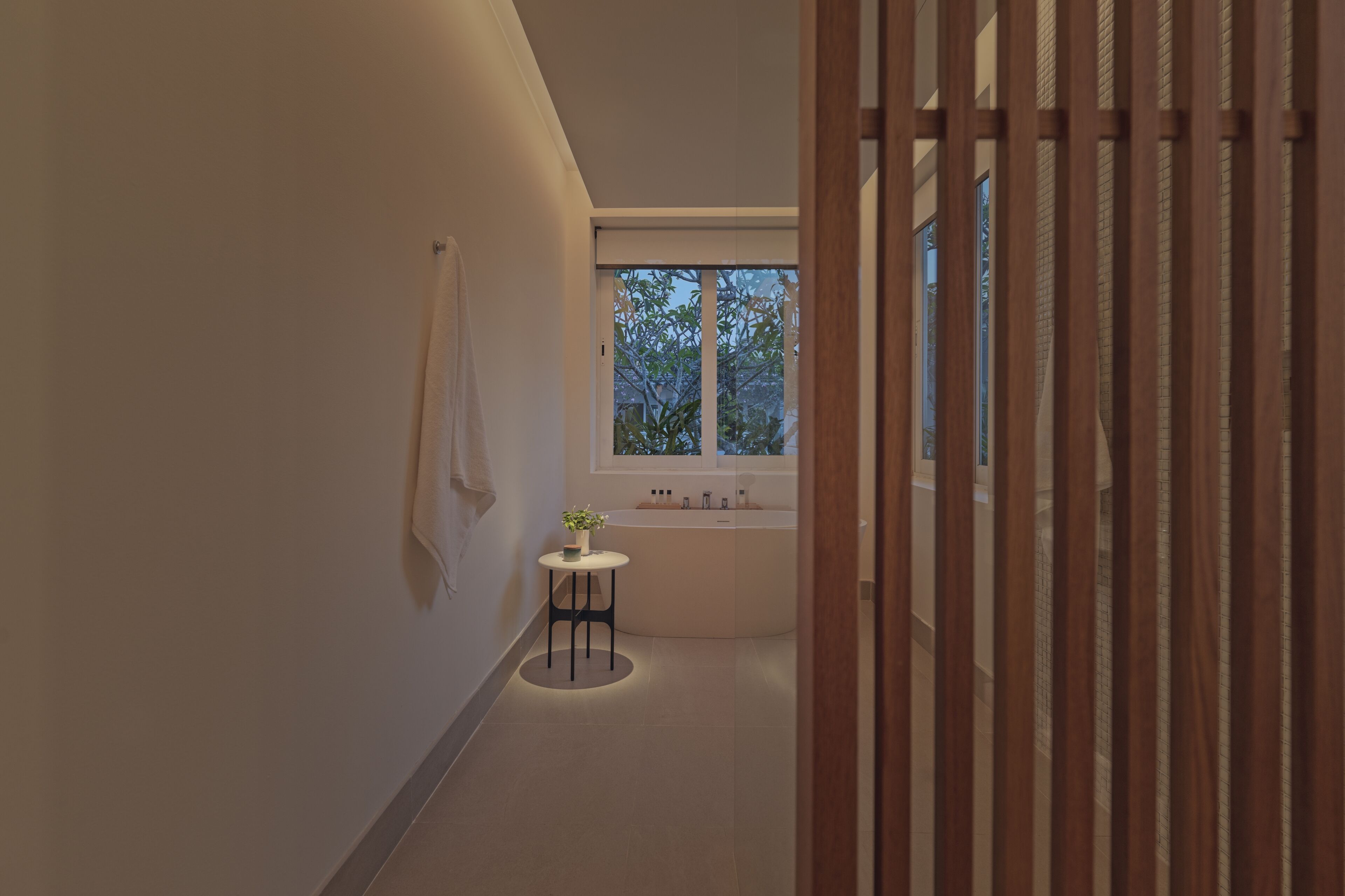 separate bathtub and shower, deep-soaking bathtub, rainfall showerhead