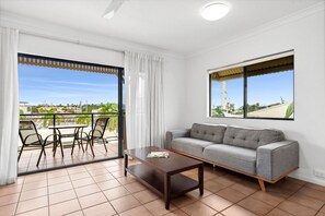 One-Bedroom Apartment | Living area | LCD TV, iPod dock