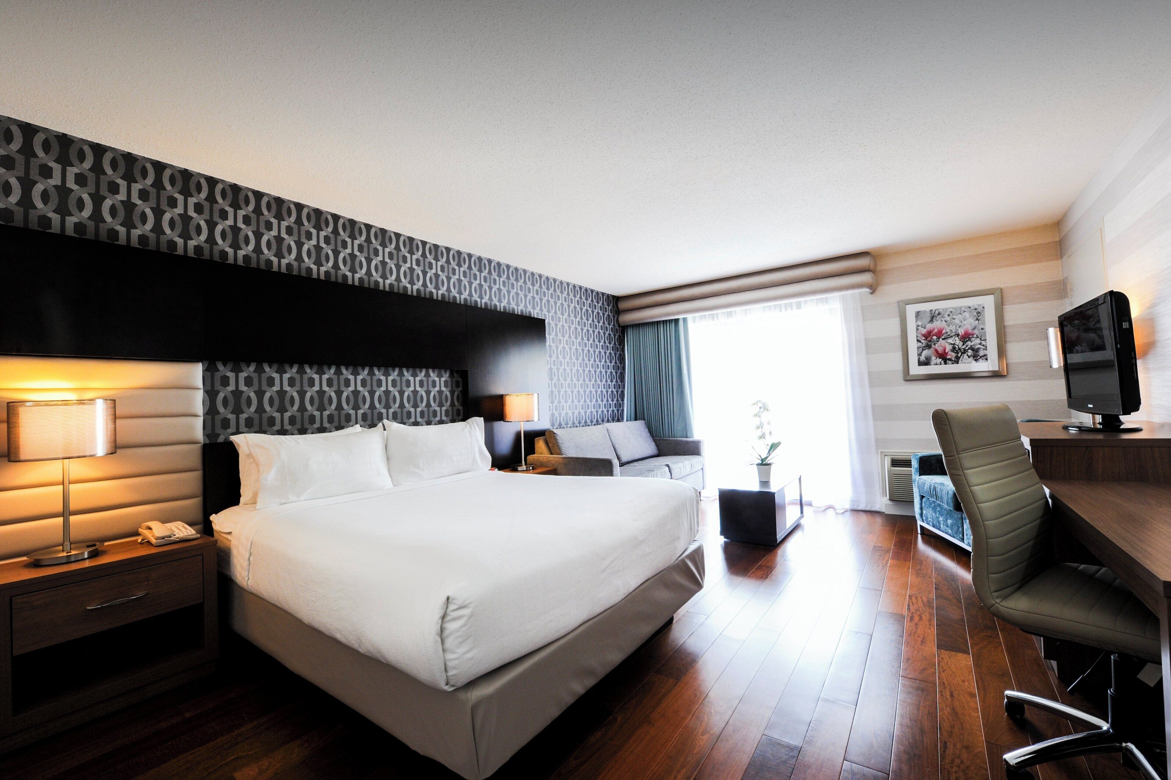 Habitación estándar, 1 cama Queen size | Cortinas blackout, tabla de planchar con plancha y cunas gratuitas 