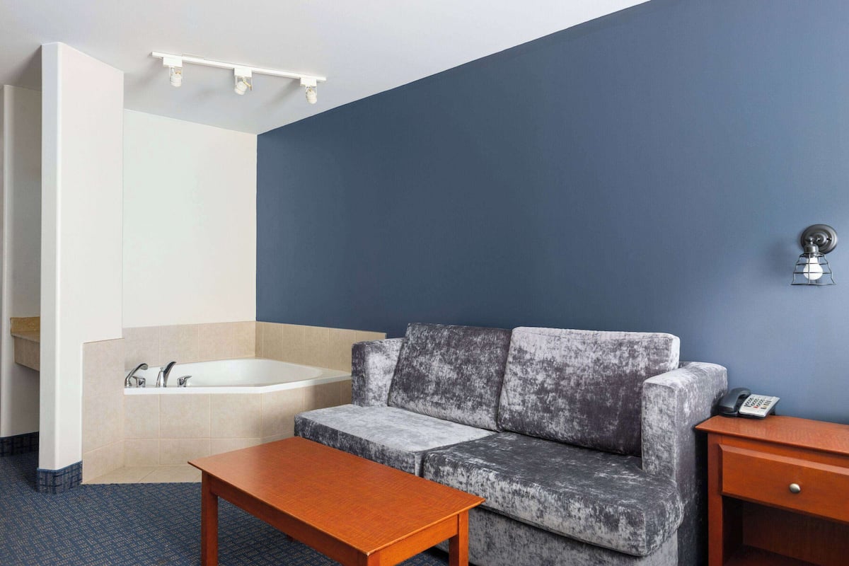 suite, 1 king bed with sofa bed | jetted bathtub