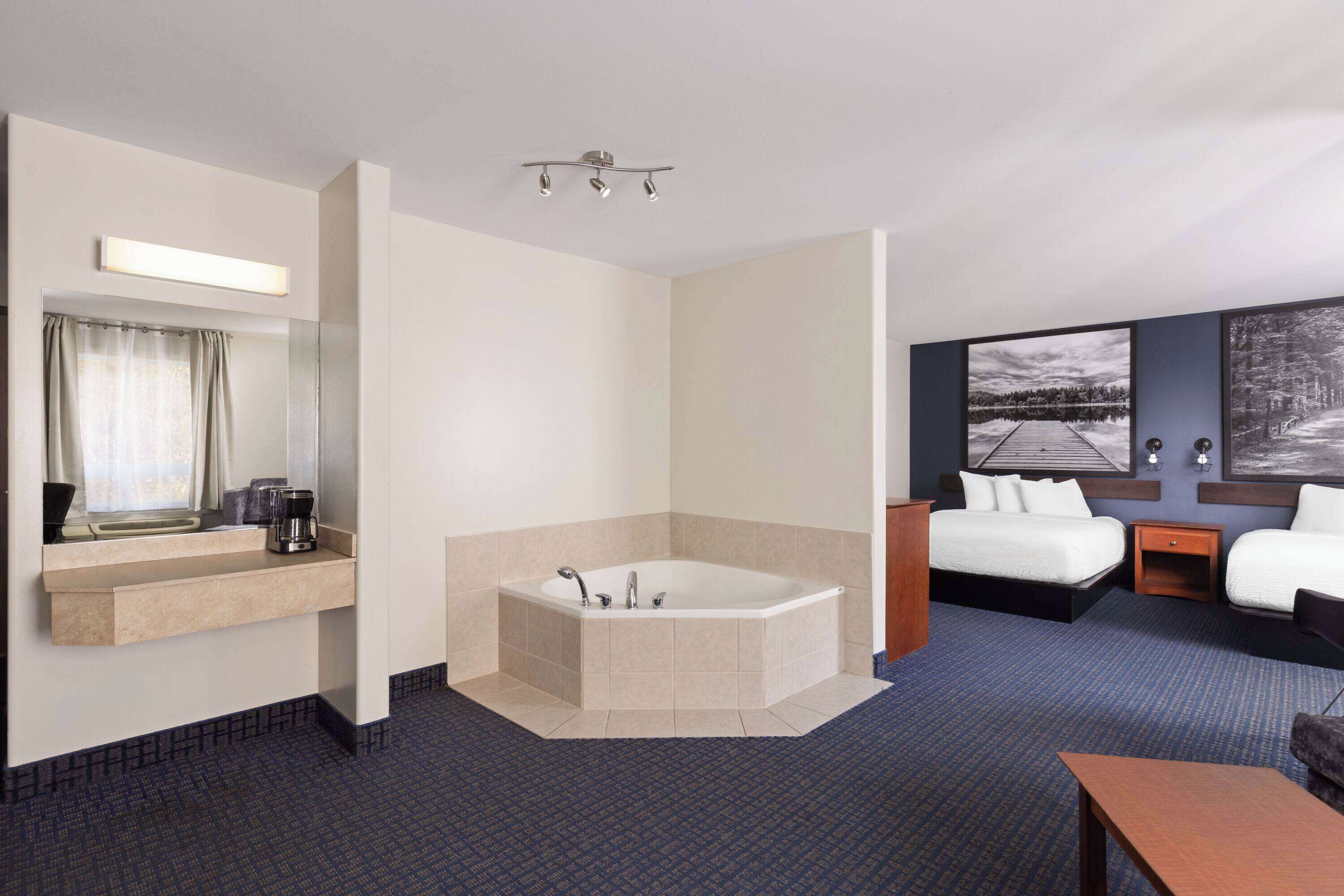 Suite, Non Smoking (2 Queens With Sofa bed) | Jetted bathtub
