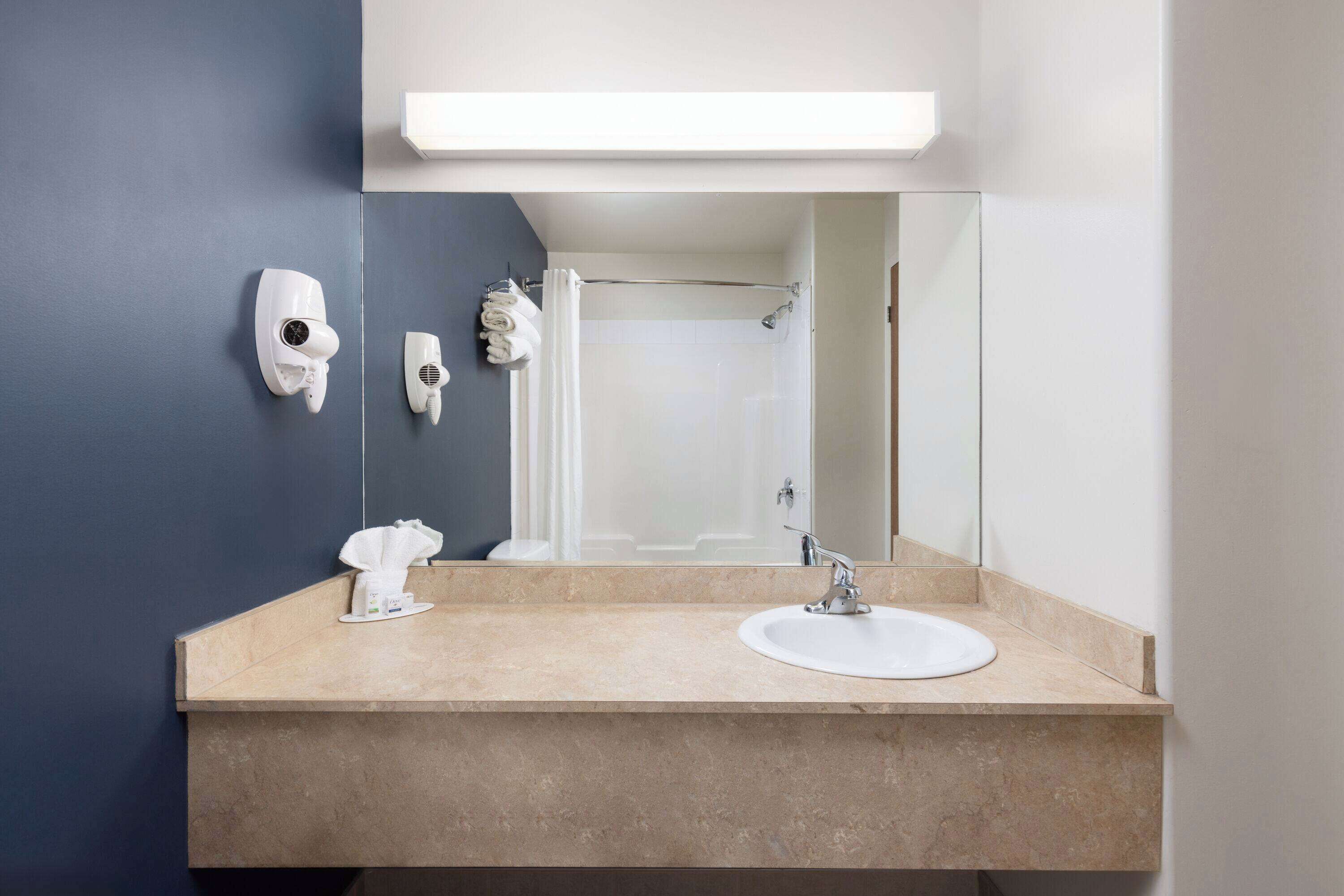 suite, non smoking (2 queens with sofa bed) | bathroom | combined shower/bathtub, free toiletries, hair dryer, towels