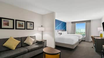 Suite, 2 Queen Beds | Desk, blackout drapes, iron/ironing board, free WiFi