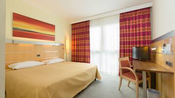 Down duvets, minibar, in-room safe, desk