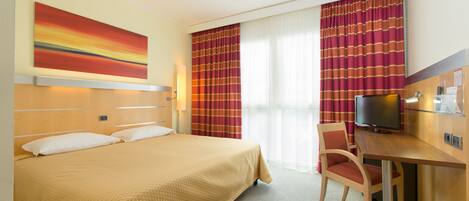 Down duvets, minibar, in-room safe, desk