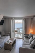 Suite | Zona de estar | Una televisión de pantalla plana