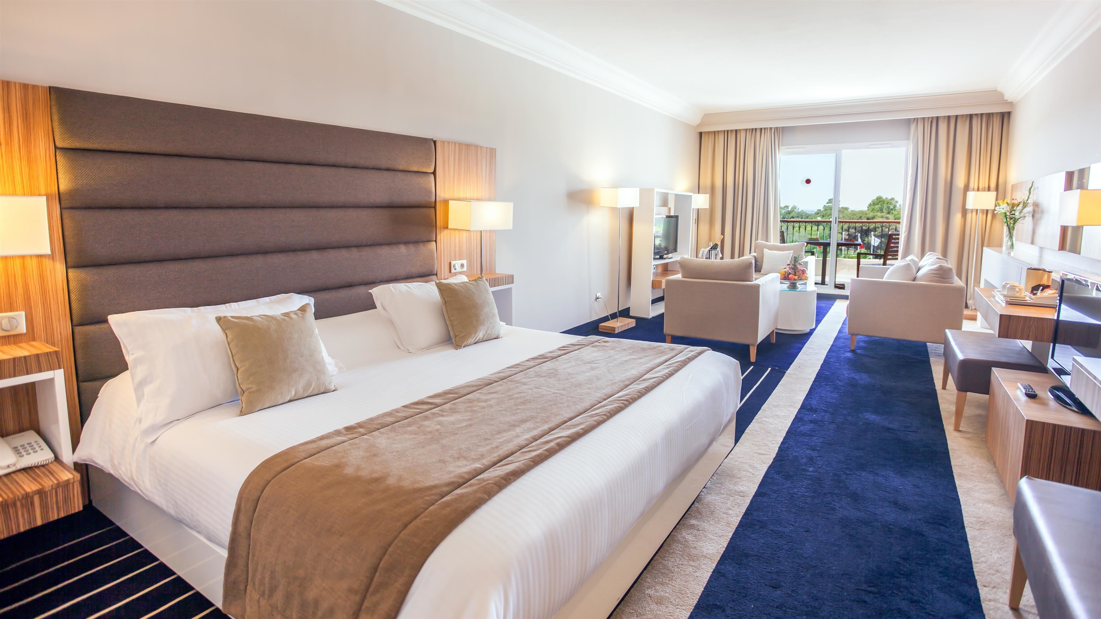 Suite ejecutiva | Minibar, caja fuerte, cortinas opacas y wifi gratis