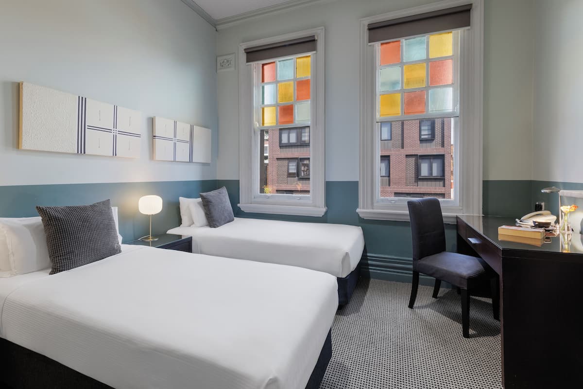 Standard Twin Room, 2 Single Beds | Minibar, desk, soundproofing, iron/ironing board