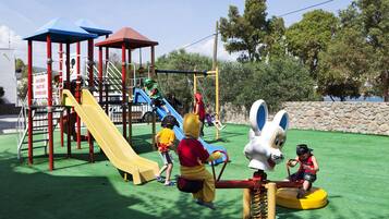 Children can play on the slides and climbing frames in this secure outdoor play area.