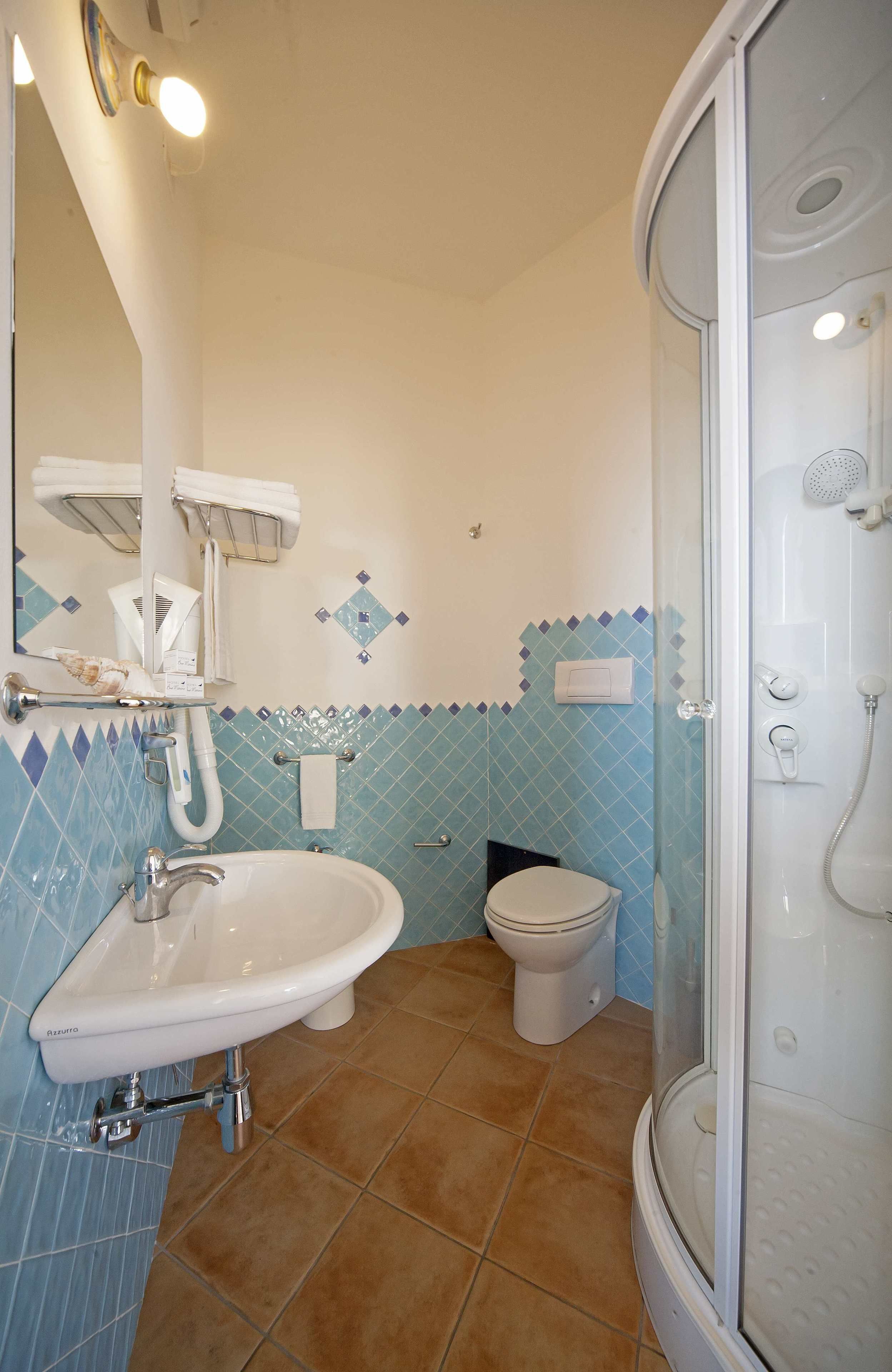 junior suite | bathroom | hair dryer, bidet, towels, soap
