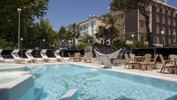 Seasonal outdoor pool, open 9:00 AM to 7:00 PM, sun loungers