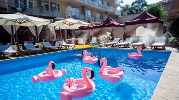 Outdoor pool, open 8:00 AM to 8:00 PM, sun loungers