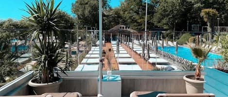 Outdoor pool, open 8:00 AM to 8:00 PM, sun loungers