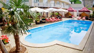 Outdoor pool, open 8:00 AM to 8:00 PM, sun loungers