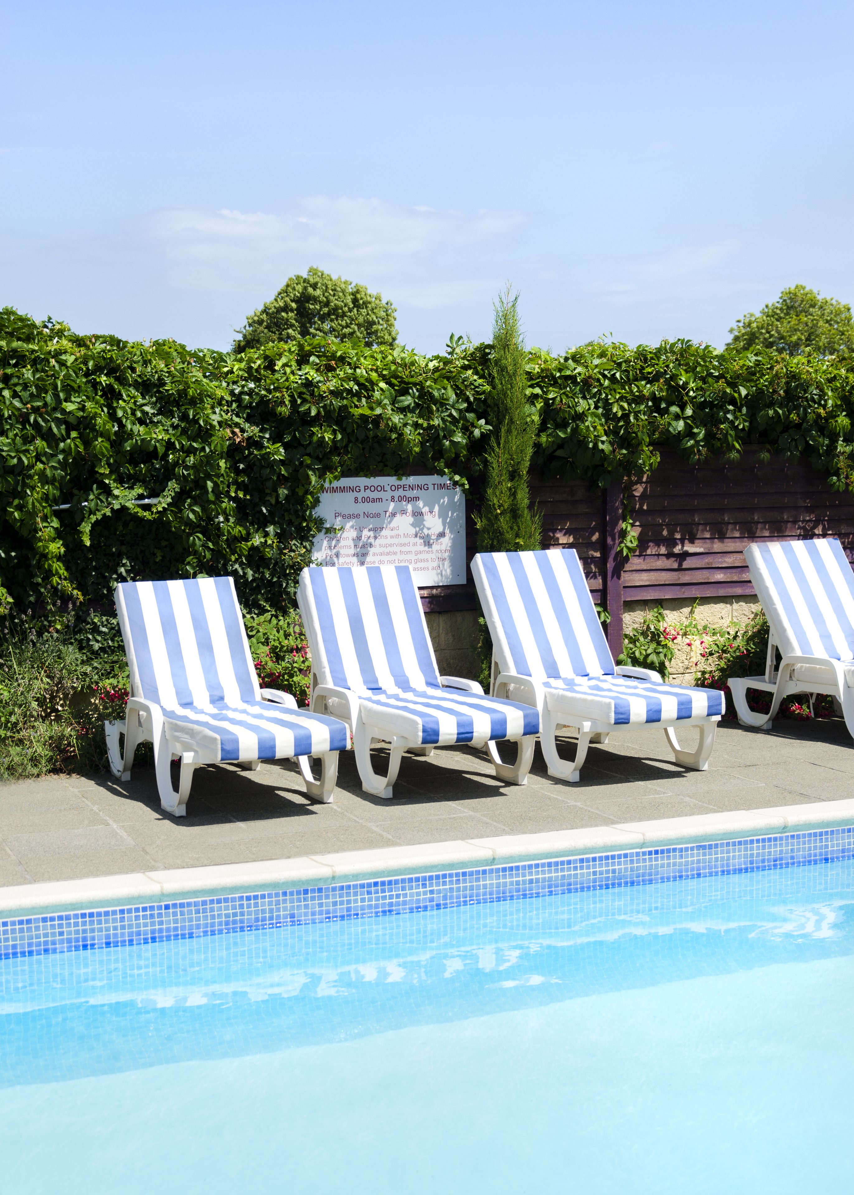 seasonal outdoor pool, pool loungers