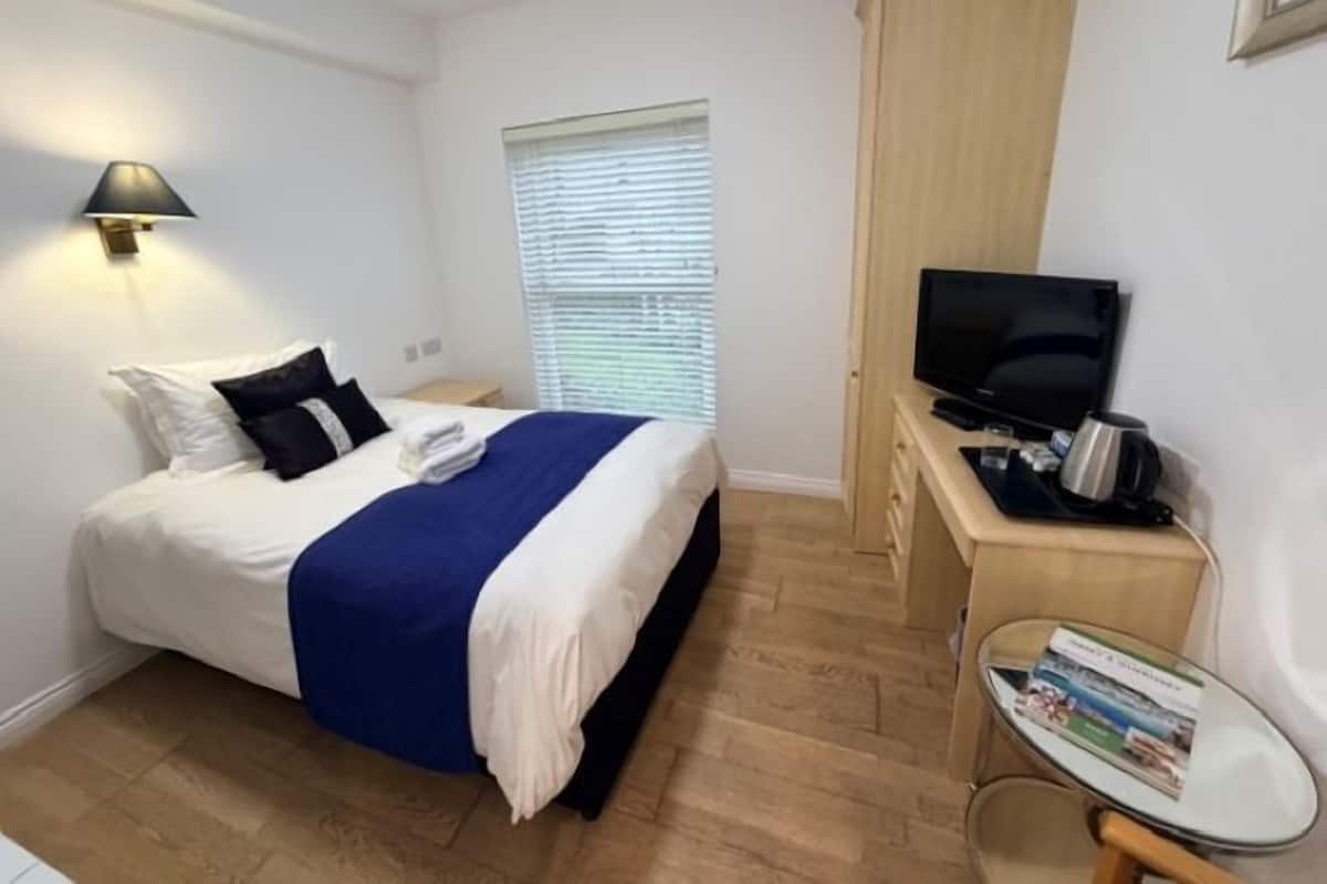 Enkeltrom – standard | Safe på rommet, individuelt dekorert og strykejern/-brett