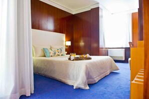 Suite | Minibar, cortinas blackout, wifi y ropa de cama 