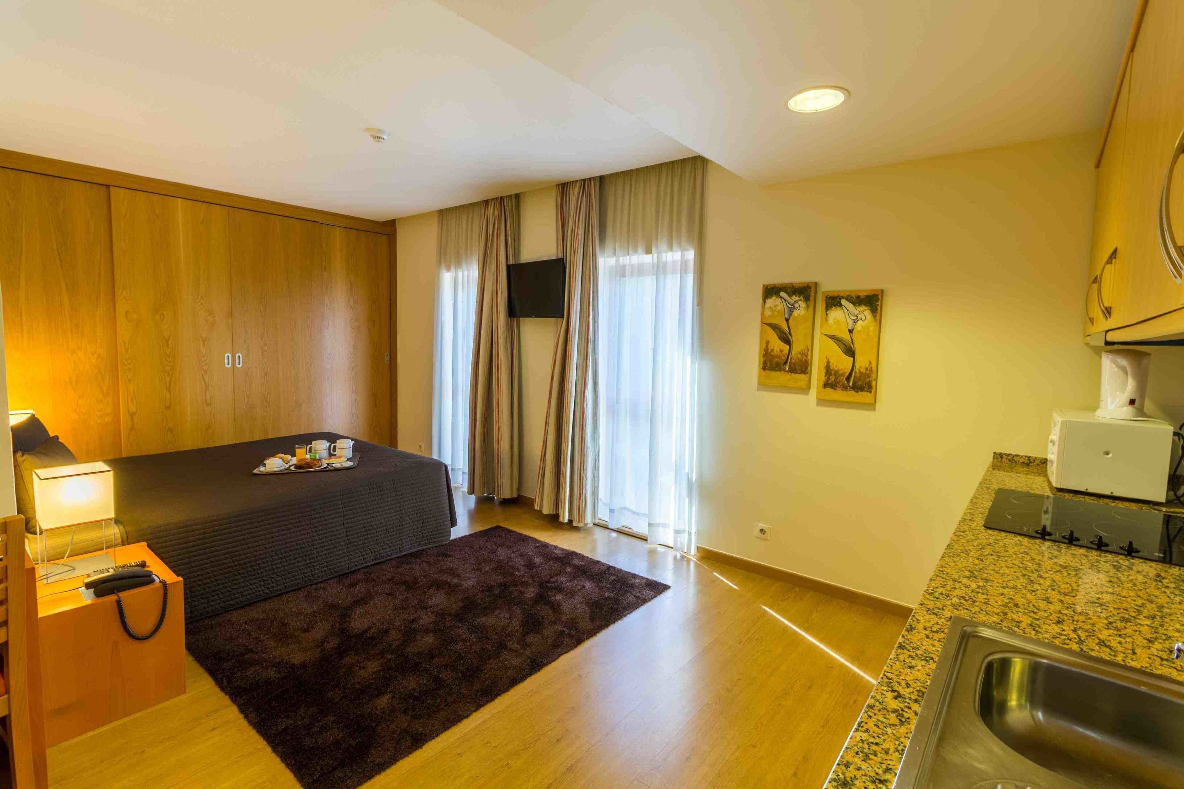In-room safe, desk, laptop workspace, blackout curtains