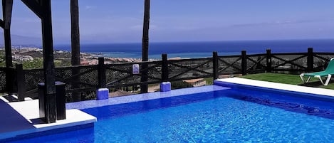 2 outdoor pools, open 10:00 AM to 9:00 PM, pool umbrellas, pool loungers