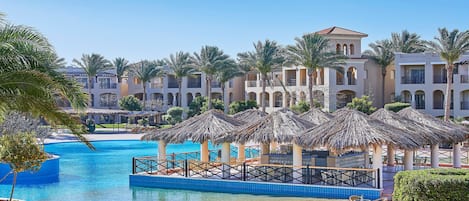 12 outdoor pools, pool umbrellas, sun loungers