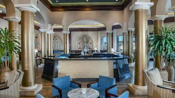 8 bars/lounges, 4 poolside bars, beach bar