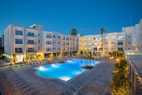 Indoor pool, 2 outdoor pools, open 9:00 AM to 7:00 PM, pool umbrellas