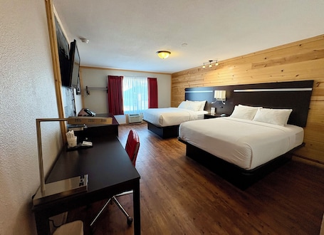 Room, 2 Queen Beds, Non Smoking (with Couch) | Individually furnished, desk, laptop workspace, blackout drapes. Americas Best Value Inn Wall