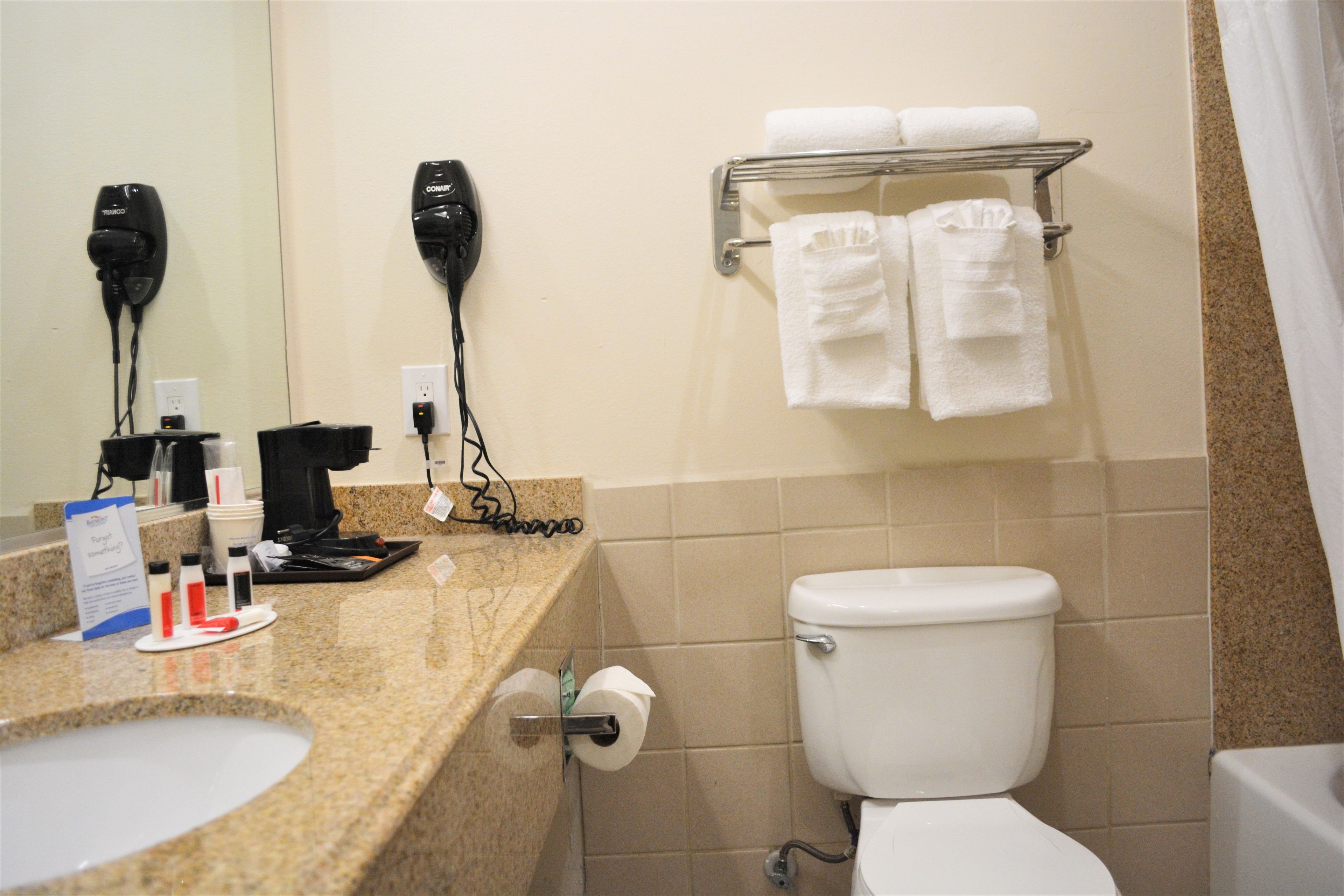 deluxe room, 2 queen beds, balcony | bathroom | free toiletries, hair dryer, towels, soap
