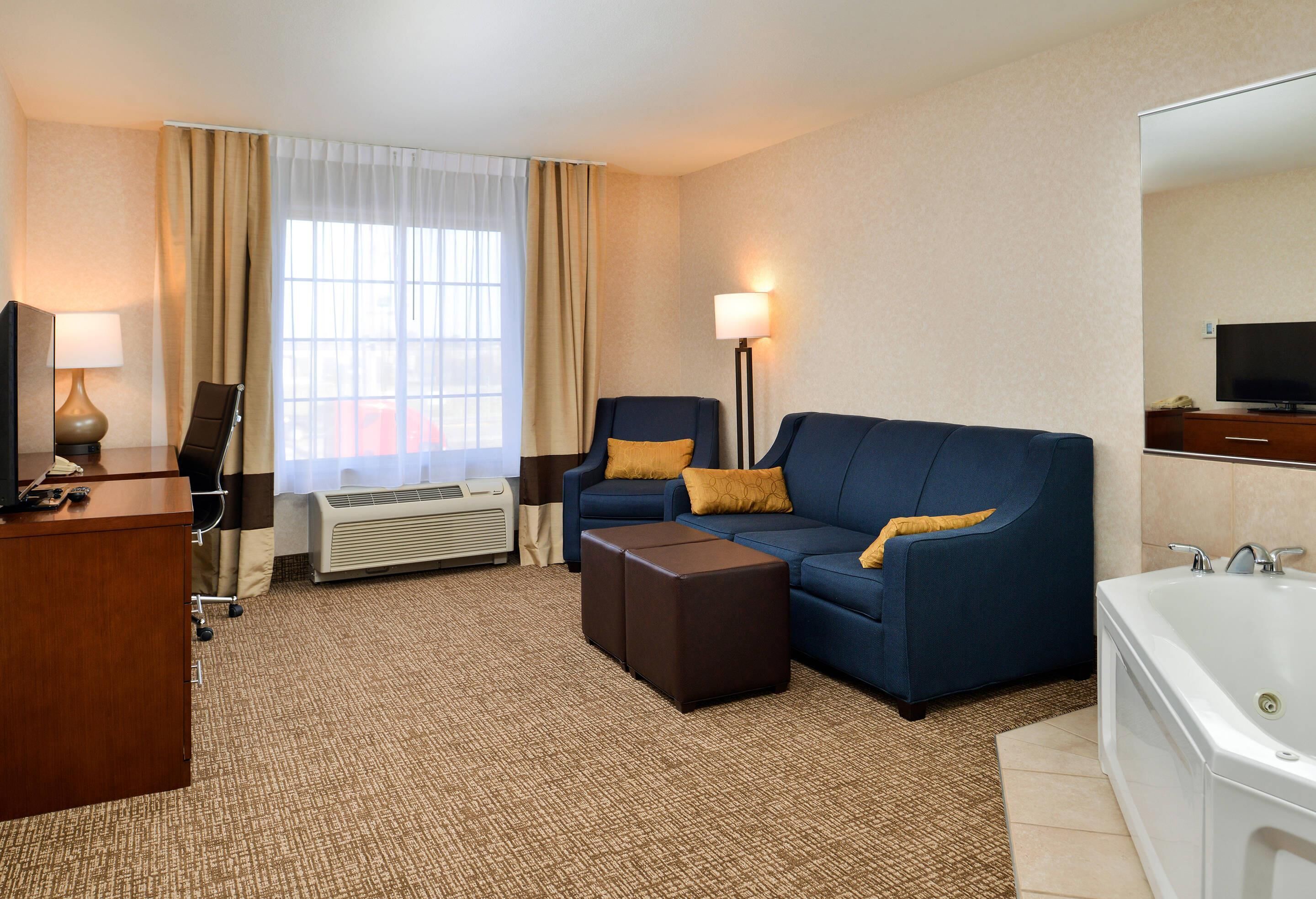 Suite, 1 King Bed with Sofa bed, Non Smoking, Kitchenette (Whirlpool, Living Room) | In-room safe, desk, laptop workspace, iron/ironing board