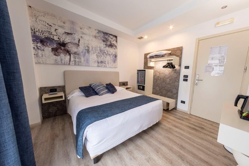 double room | down duvets, minibar, in-room safe, desk