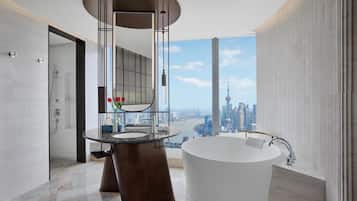 Premium Bund View Suite | Bathroom | Separate tub and shower, rainfall showerhead, designer toiletries