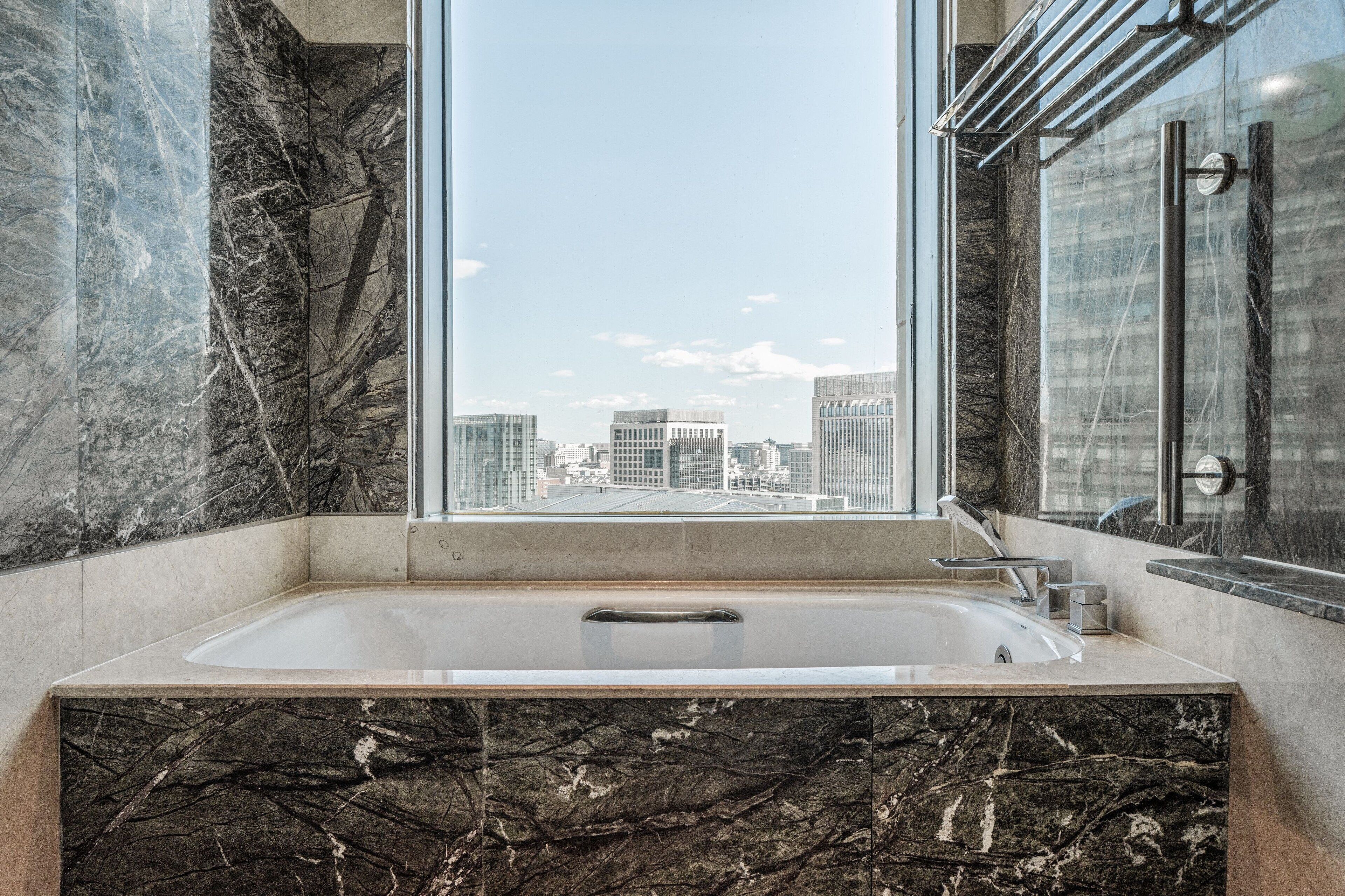 club room, 1 king bed, garden view | bathroom | separate bathtub and shower, rainfall showerhead, designer toiletries