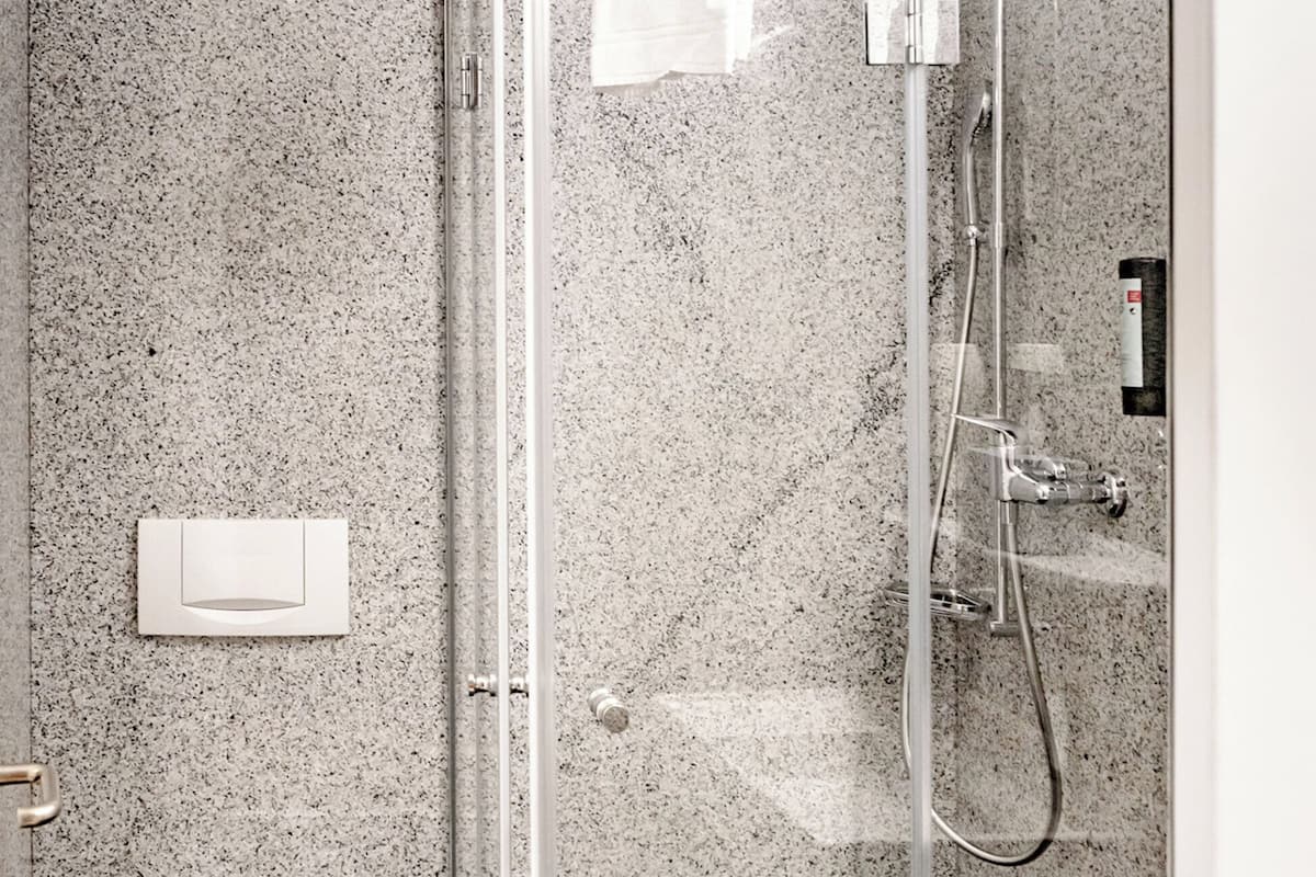 shower, eco-friendly toiletries, hair dryer, towels