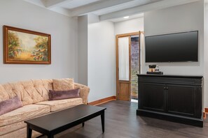 Premium Suite, 1 King Bed | In-room safe, iron/ironing board, Internet, bed sheets