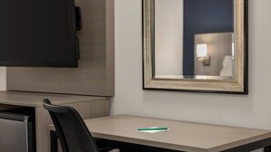 A hotel room with a desk, a chair, a television, and a mirror. - Quality Inn Lake Elsinore I-15 (Lake Elsinore)