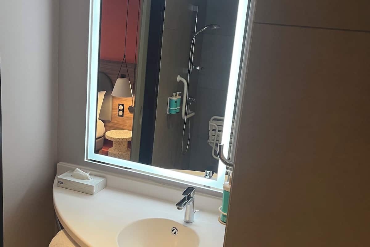 superior suite | bathroom | separate bathtub and shower, eco-friendly toiletries, hair dryer, towels