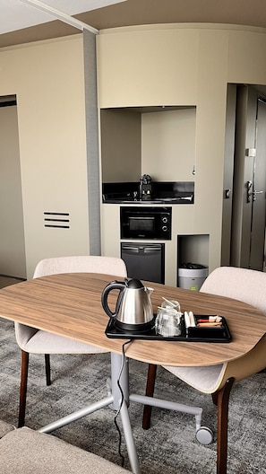 Mini-fridge, microwave, coffee/tea maker, electric kettle