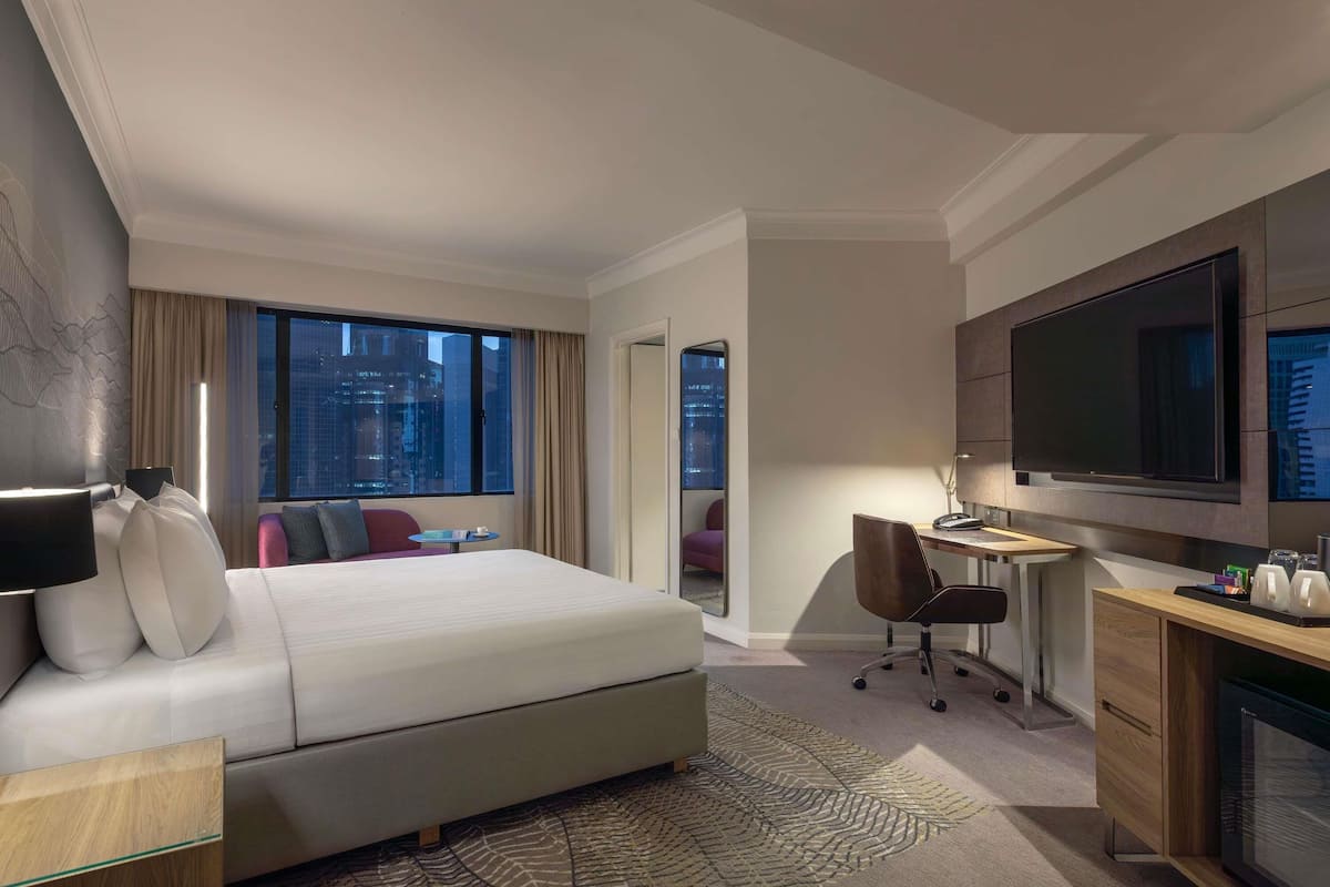 Habitación ejecutiva, 1 cama King size | Minibar, caja de seguridad en la habitación y escritorio