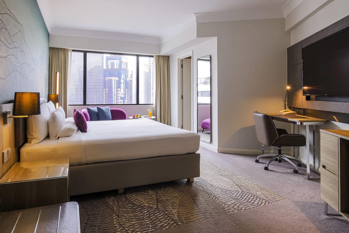 Chambre exĂ©cutive, 1 trĂšs grand lit | Minibar, coffre-fort, bureau, rideaux dâobscurcissement