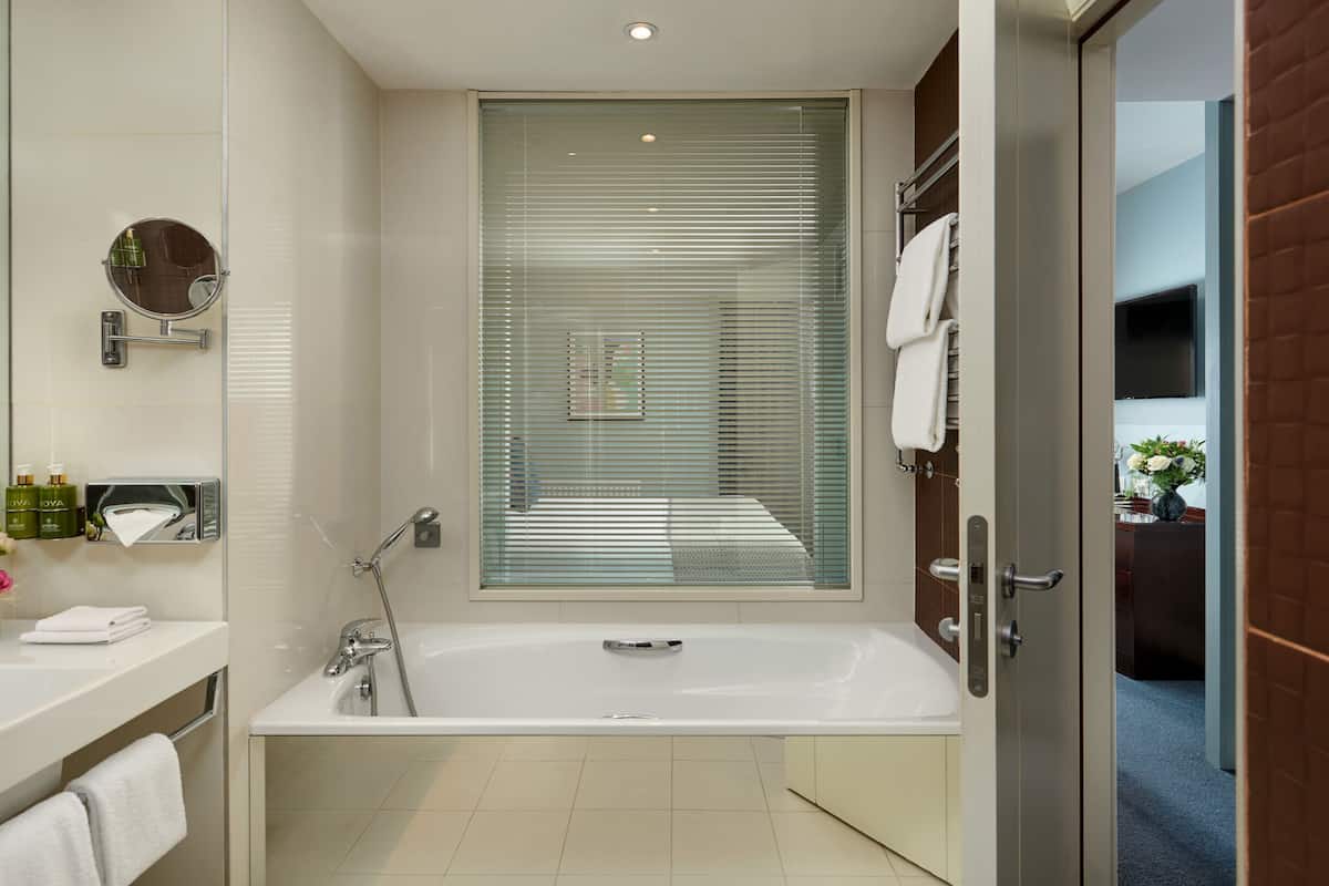 separate bathtub and shower, free toiletries, hair dryer, towels