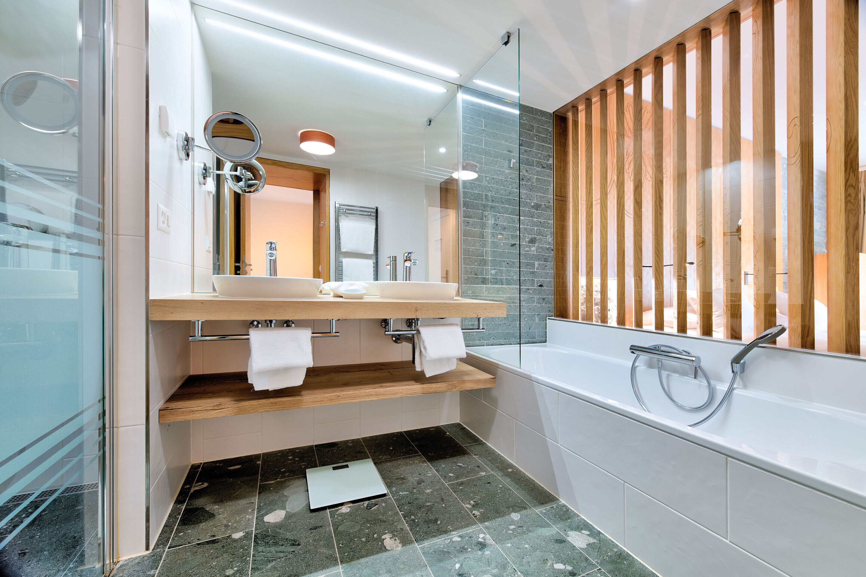 shower, free toiletries, bathrobes, slippers