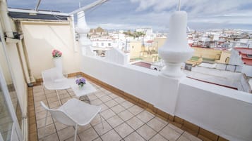 Habitación cuádruple, terraza | Terraza o patio