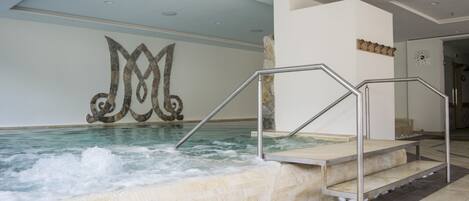Indoor pool, outdoor pool, open 10:00 AM to 7:30 PM, pool loungers