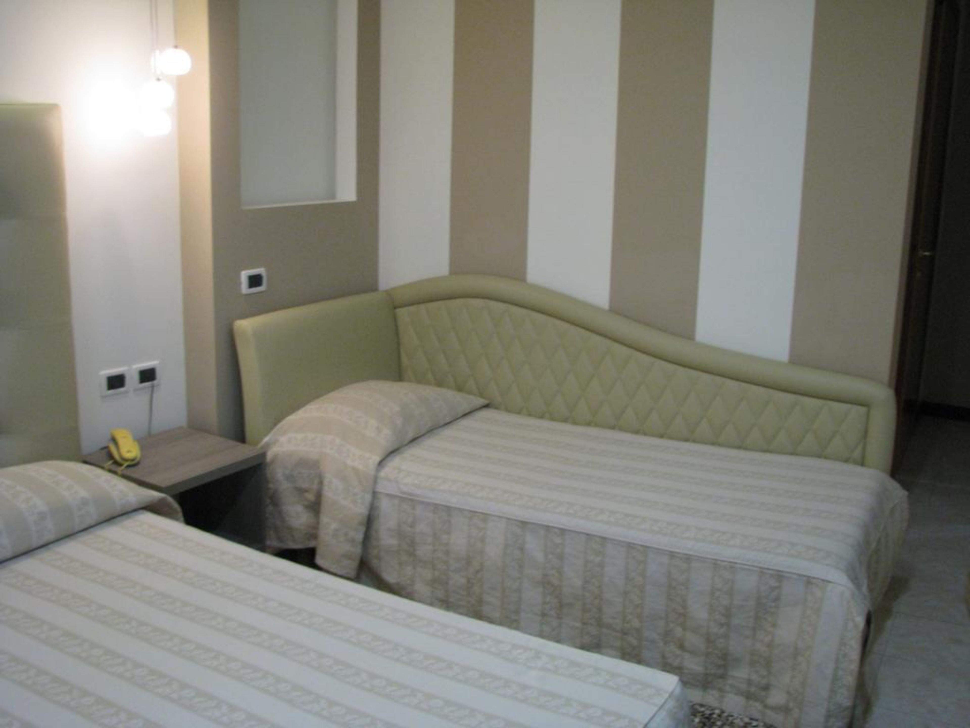 deluxe triple room | down duvets, minibar, in-room safe, desk