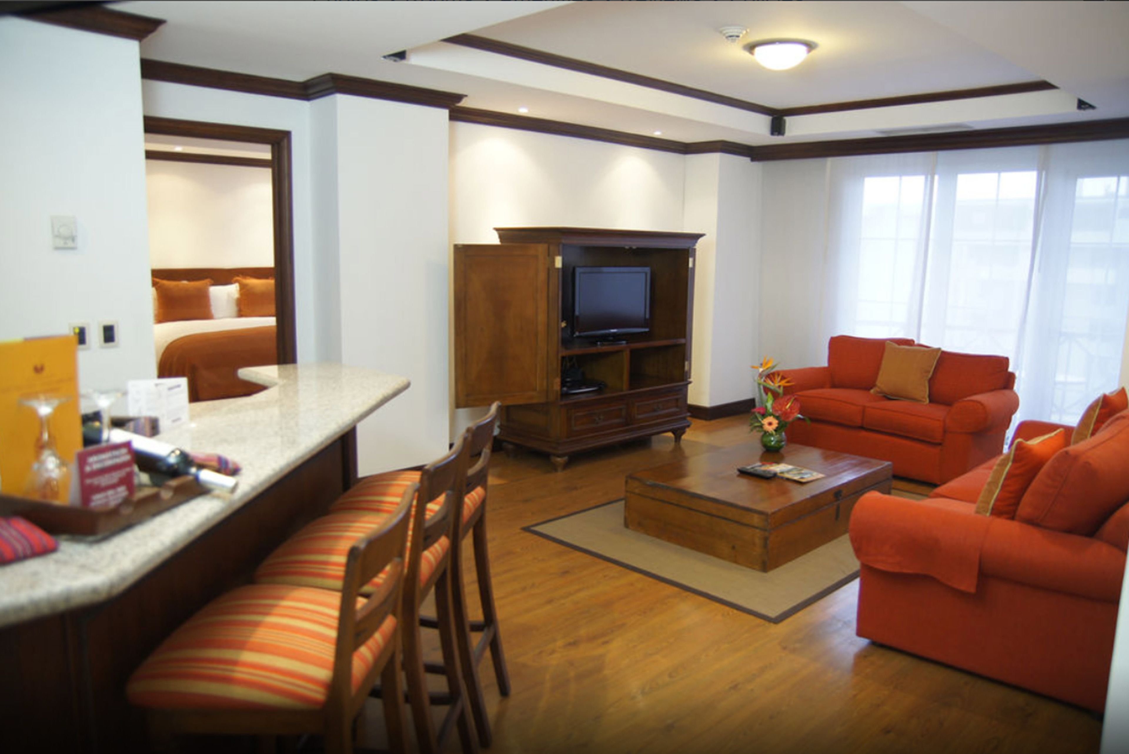 master suite 1 king bed | in-room safe, desk, laptop workspace, blackout curtains