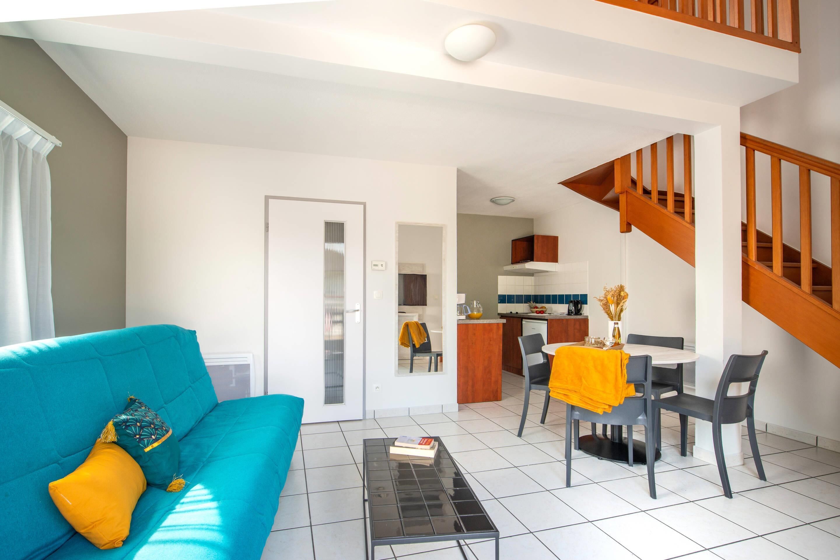 Appartement 1 chambre 4 personnes | Cozinha privada | Cooktop, chaleira elétrica, talheres/pratos/utensílios de cozinha