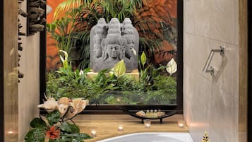 Separate tub and shower, free toiletries, hair dryer, bathrobes